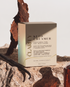 CLARITY Keto Creamer – Schachtel auf Naturstein mit Vanilleschote und Baumrinde